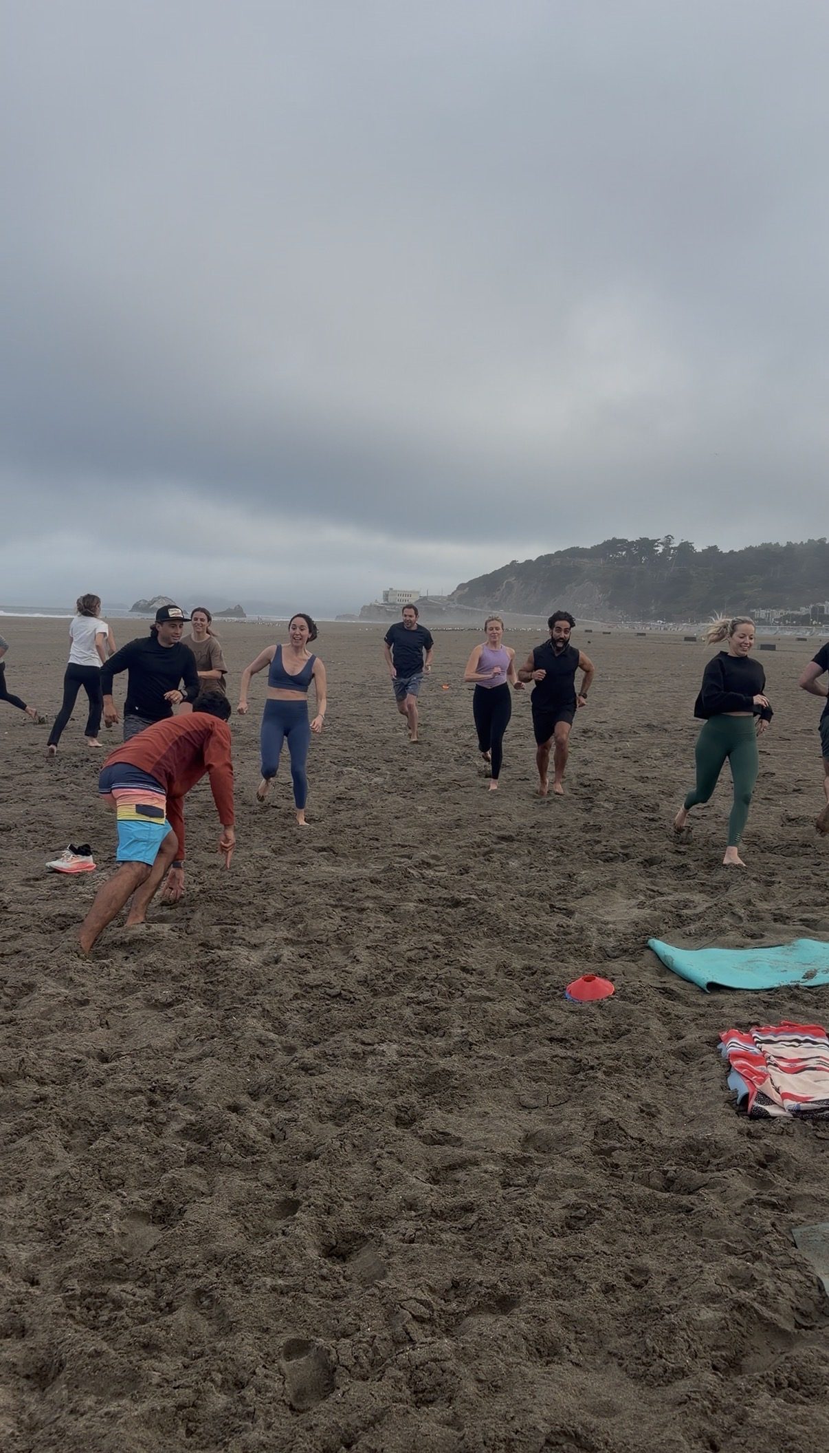 Sprint intervals on the sand during a Full Send Fridays circuit