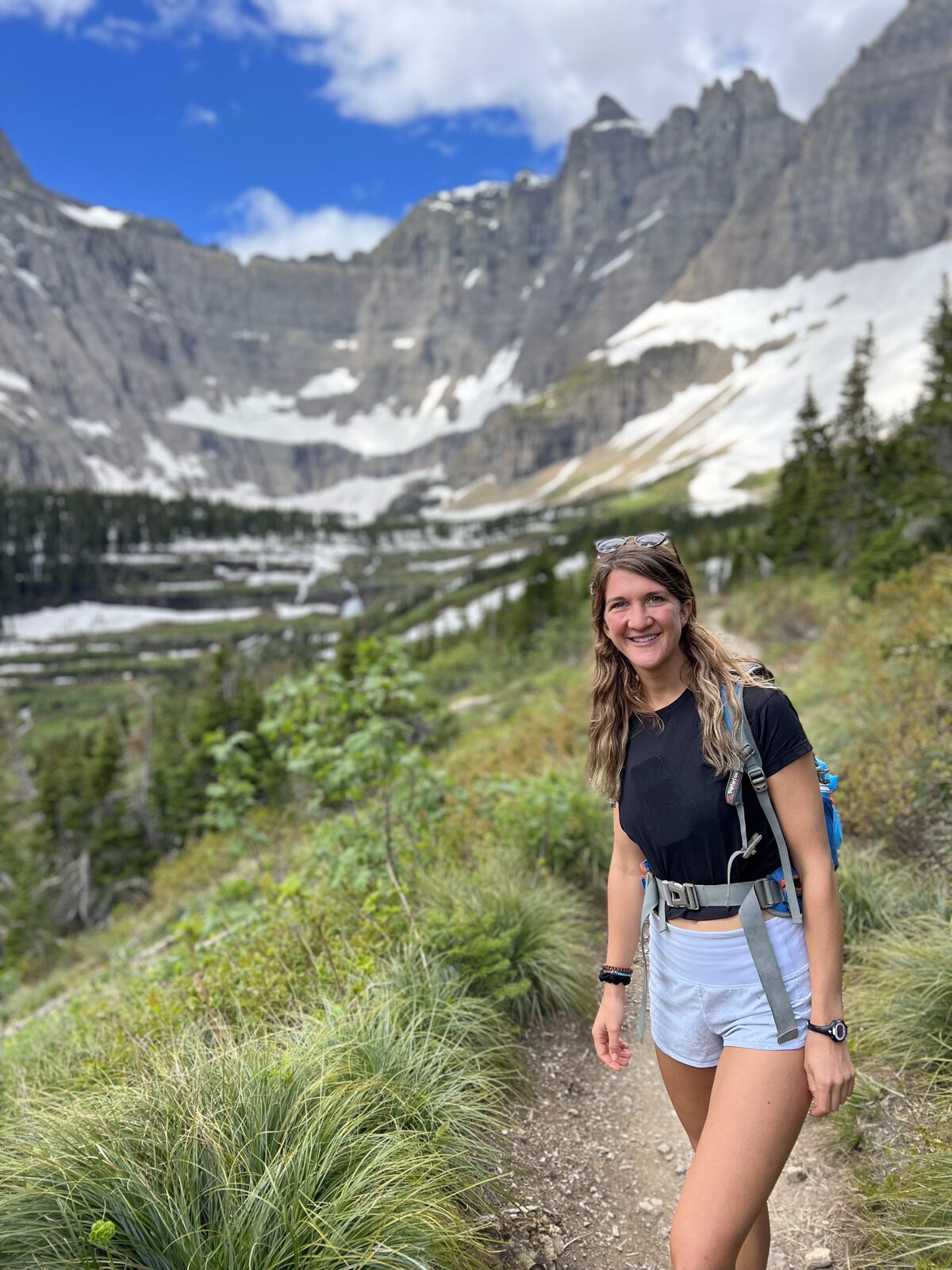 Dr. Emmy Haw hiking in the mountains
